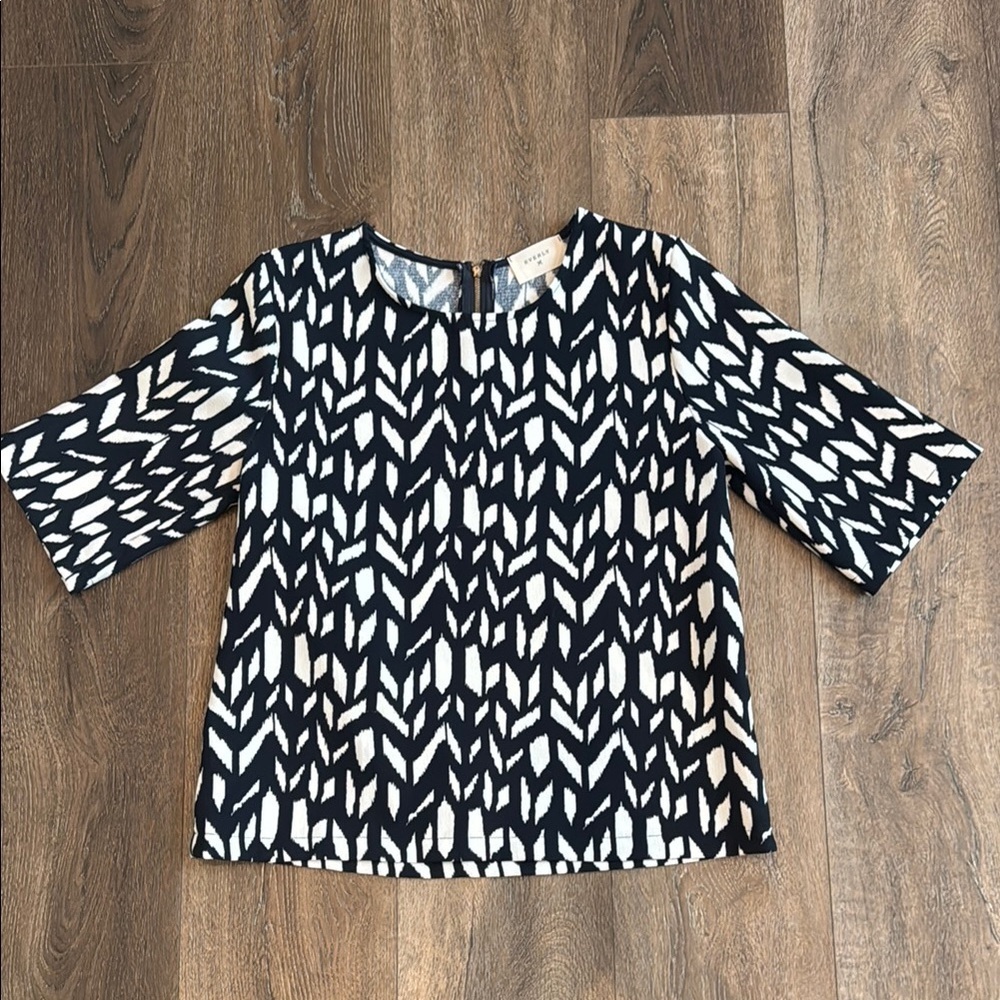 Everly top, women’s size small.  Navy blue and off white design.